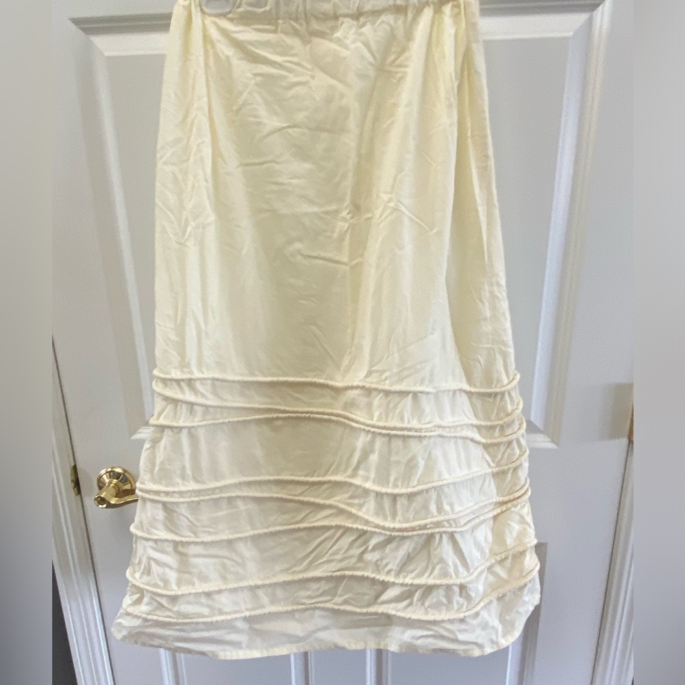 Krista Larson mid-length cream skirt